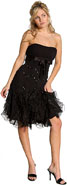 Prom Dress item c27778. Ruffled Strapless Short Prom Dress. Ruffles cascading on the skirt of this dress gives it a very eloquent look. Silver beadwork and a satin bow accentuates this short prom dress. Made of Organza and Polester Chiffon.