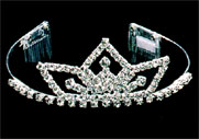 Accessories item ps84. . Crystal rhinestone tiara with combs in silver tone. Measures 2" in height. 