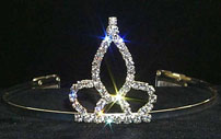 Accessories item ss121. Rhinestone Tiara. Crystal Rhinestone Tiara with combs in Silver; height measures 2 1/4".
